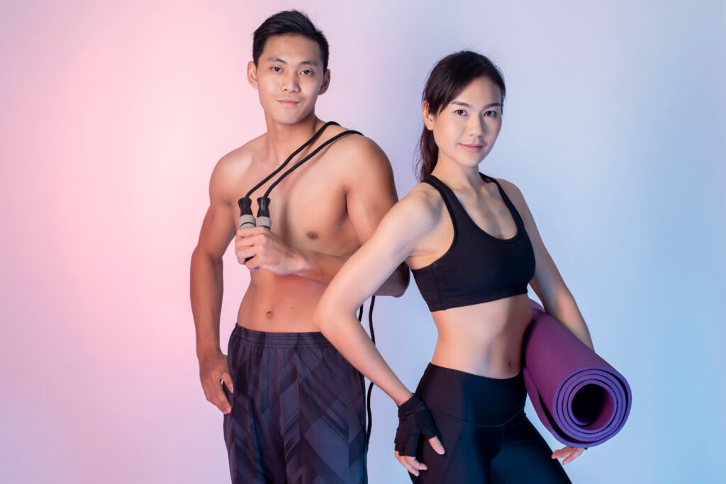 Portrait of fitness people is happy in studio