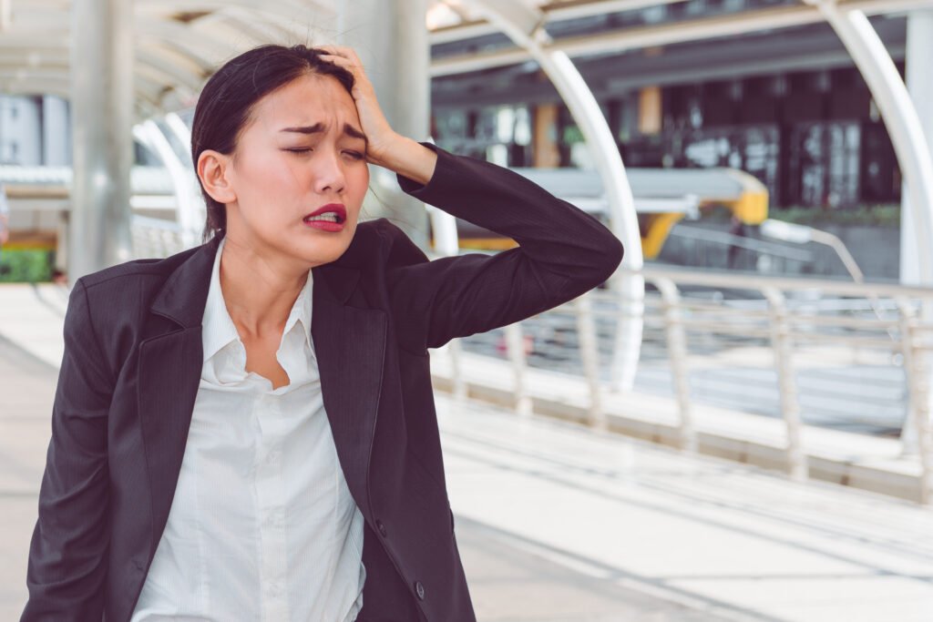 Young depressed businesswoman